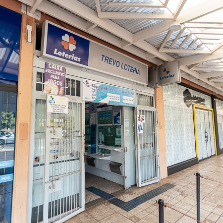 Logo da loja trevo loterias